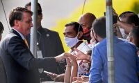 ‘Brazil’s president Jair Bolsonaro has frequently appeared in public places without a mask, stopping to greet supporters.’ Photograph: Evaristo Sa/AFP/Getty Images