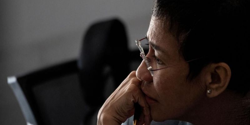 Journalist, Maria Ressa, is seen at the National Bureau of Investigation in Manila, Philippines. Ressa was released on bail following her arrest for criticising President Rodrigo Duterte causing international censure. Photo: Getty Images. 