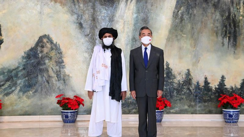 Chinese State Councilor and Foreign Minister Wang Yi meets with Mullah Abdul Ghani Baradar, political chief of Afghanistan's Taliban, in north China's Tianjin, 28 July 2021. Li Ran Xinhua via AFP