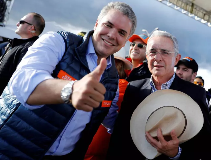 Iván Duque (izquierda), junto a Álvaro Uribe en la campaña de 2019.Nacho Doce