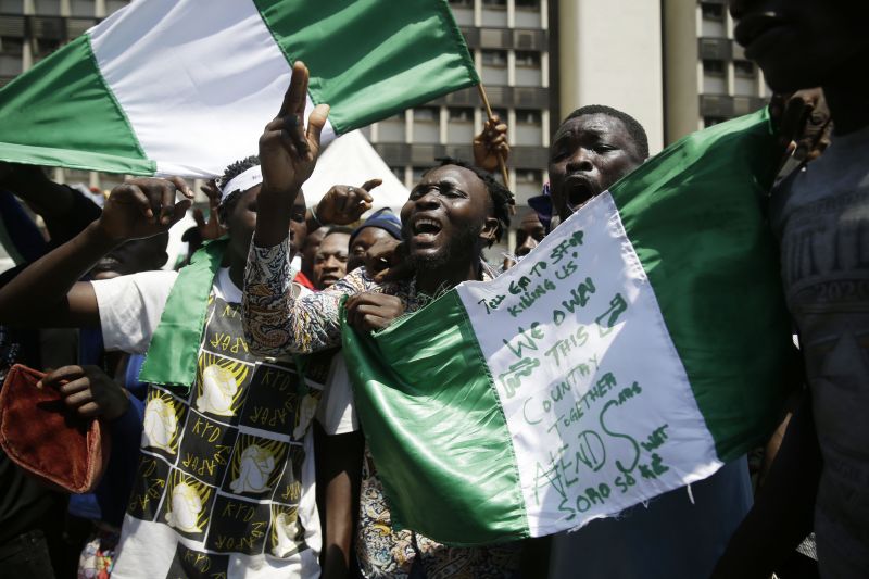Demonstrators in Lagos, Nigeria, protest police brutality in October 2020. (Sunday Alamba/AP)