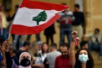 Lebanese anti-government protesters shout slogans during an Oct. 17 rally in downtown Beirut to mark the second anniversary of the beginning of the protest movement. (Wael Hamzeh/EPA-EFE/REX/Shutterstock)
