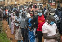 Ugandans wait to vote in the presidential election in Kampala, Uganda. (Jerome Delay/AP)