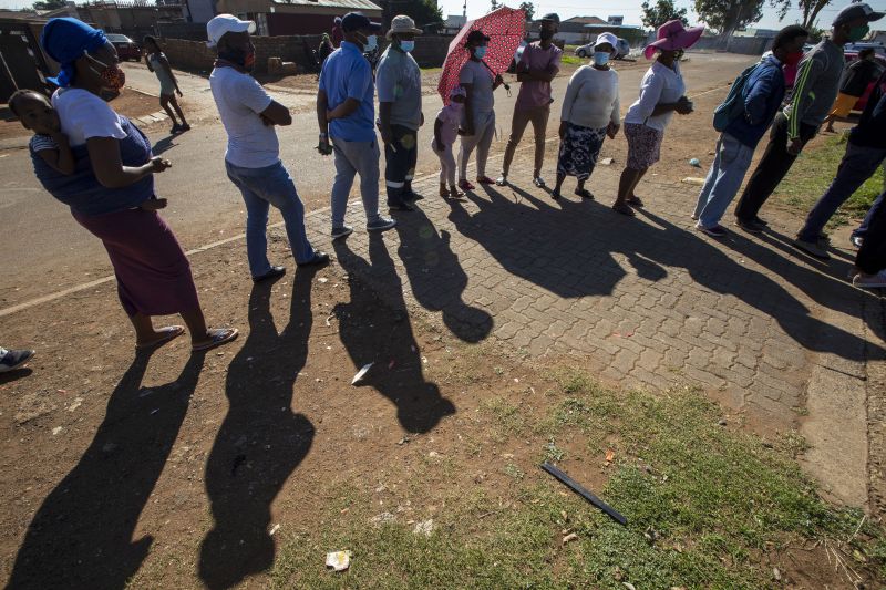 People queue outside a polling station in Thokoza, east of Johannesburg, on Nov. 1. (Themba Hadebe/AP)