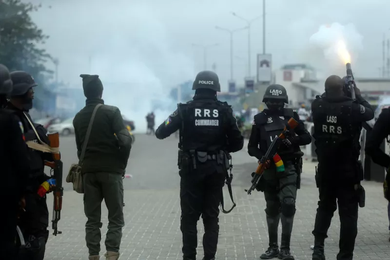 Police officers dispersed protesters with tear gas after a demonstration at Lekki Toll plaza in Lagos, Nigeria, on Oct. 20, 2021. (Sunday Alamba/AP)