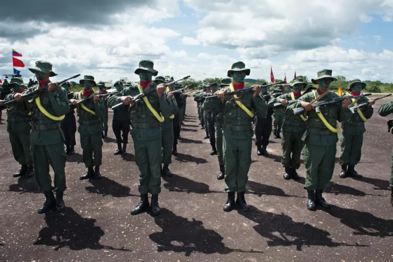  Members of the Venezuelan army take part in a military parade in Tumeremo, Bolívar state, Venezuela, about 56 miles from the border with Guyana, on July 21, 2015. FEDERICO PARRA/AFP via Getty Images 