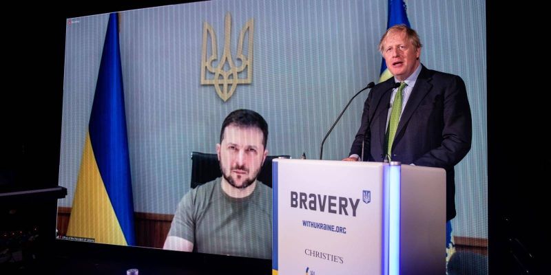  UK prime minister Boris Johnson speaks in front of a live video feed with Ukraine president Volodymyr Zelenskyy at the Tate Modern in London, England during the Ukrainian embassy's 'Brave' event. Photo by Chris J Ratcliffe/Getty Images. 