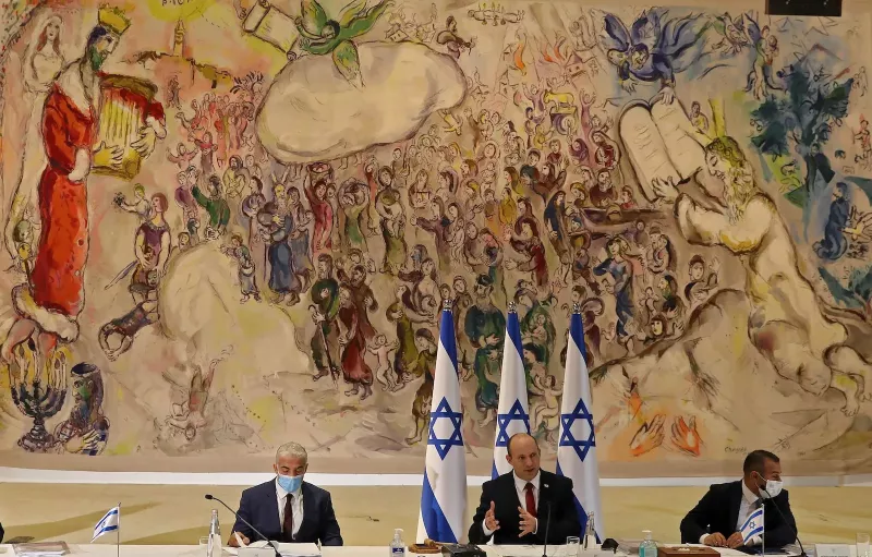 Naftali Bennett (center) speaking during a cabinet meeting at Chagall State Hall in the Knesset, Jerusalem, July 2021. Gil Cohen-Magen/Pool/AFP/Getty