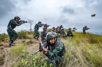 Members of special operations forces take part in a military drill in Yulin, South China’s Guangxi Zhuang Autonomous Region, on May 17.CFOTO/Future Publishing via Getty Images