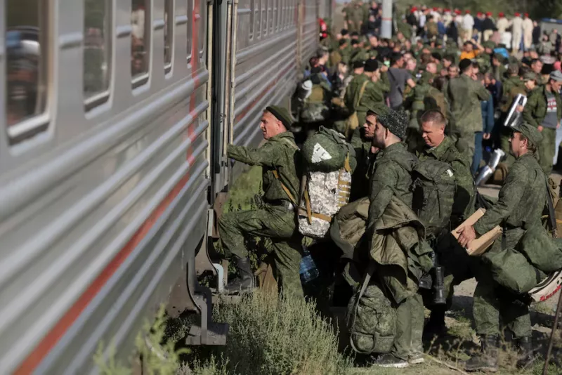 Russian military recruits board a train in Prudboi, Russia, on Sept. 29. (AP)