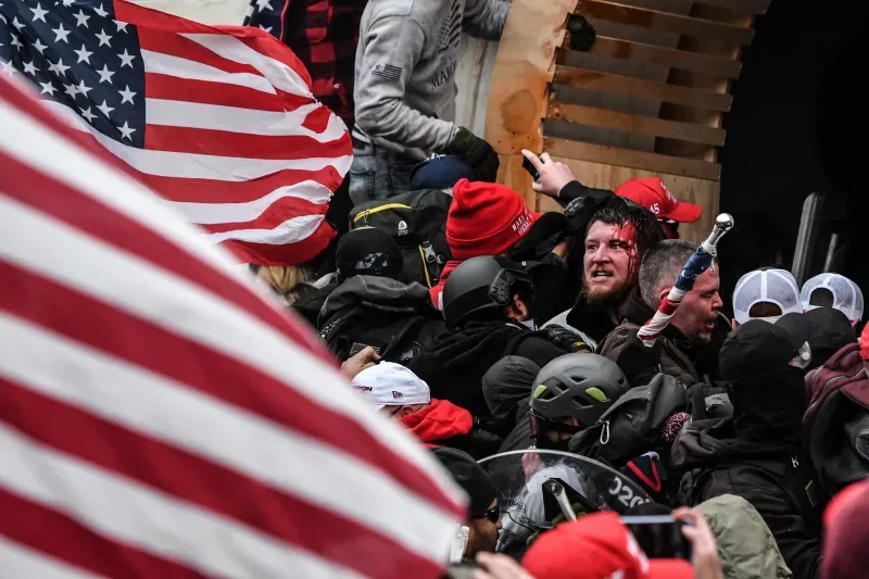 Supporters of U.S. President Donald Trump clash with police at the west entrance of the Capitol during a "Stop the Steal" protest outside of the Capitol building in Washington D.C. U.S. January 2021 