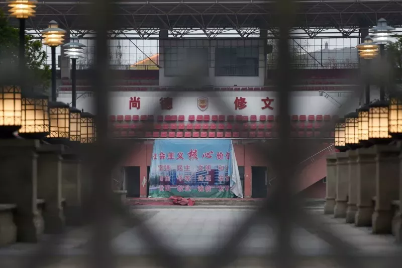 A shut school in Wuhan, with a banner displaying the Chinese core socialist values. The coronavirus outbreak from the city led to a rush to expand connectivity so education could shift online © Stringer/Reuters