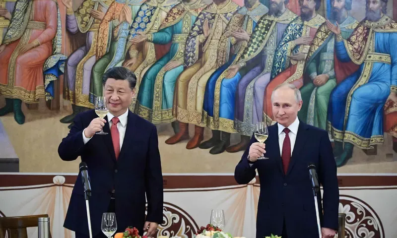 Xi Jinping and Vladimir Putin at a reception following their talks at the Kremlin, Moscow, 21 March 2023. Photograph: Pavel Byrkin/SPUTNIK/AFP/Getty Images
