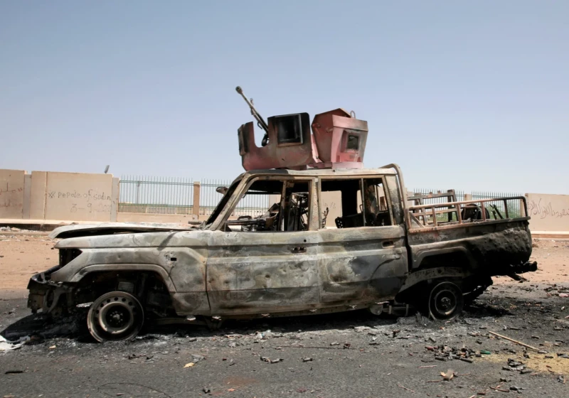 A destroyed military vehicle in Khartoum, Sudan. Marwan Ali/Associated Press