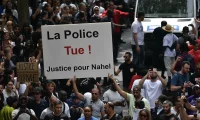 Protesters in Paris following the death of 17-year-old Nahel, 29 June 2023. Photograph: Anadolu Agency/Getty Images