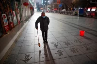 Practicing calligraphy in Jiujiang, China, February 2020. Thomas Peter / Reuters