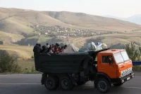 A truck carrying Armenian refugees from Nagorno-Karabakh on the road between Kornidzor and Goris, Armenia, September 28, 2023. Alain Jocardi/AFP/Getty Images