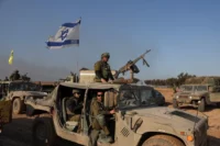 Israeli soldiers near the Gaza border, southern Israel, December 2023. Ronen Zvulun / Reuters