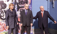 Angela Merkel, Jacques Delors and Helmut Kohl with a piece of the Berlin Wall, 2005. Photograph: Rex/Shutterstock