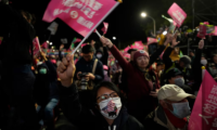 ‘We will celebrate … peaceful transition of power, with graceful concession speeches, transparent voting, and efficient procedures.’ A DPP rally in Taipei. Photograph: Ng Han Guan/AP