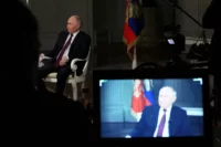 Russian President Vladimir Putin giving an interview to right-wing broadcaster Tucker Carlson, Moscow, February 2024. Gavriil Grigorov / Sputnik / Kremlin